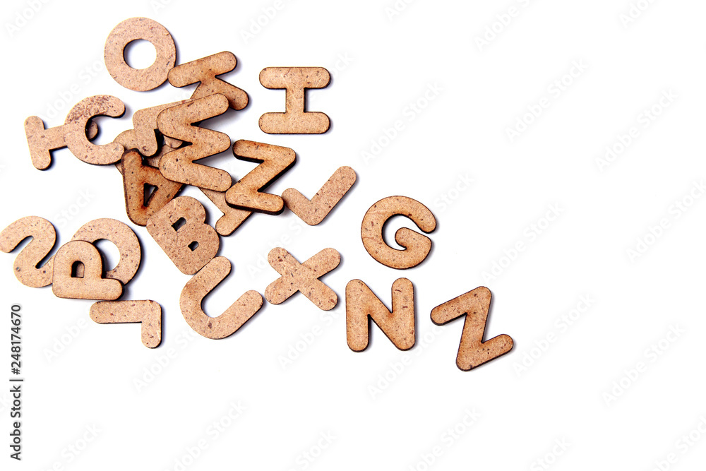 wooden cubes for the training and development of the child on a white background. child development concept. copy space for you text wooden cubes for the training and development of the child on a white background. child development concept. copy space for you text