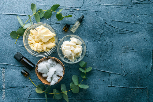 diy body butter with ingrdients on concrete background