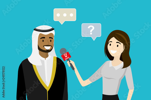 Female television reporter with microphone interviews arabic businessman