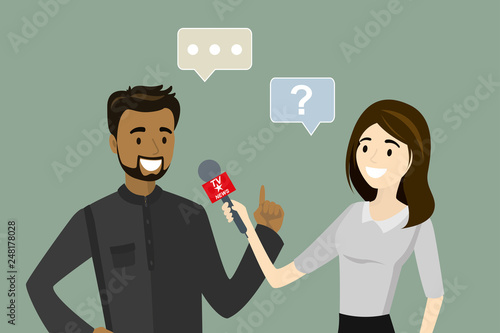 Female television reporter with microphone interviews arabic businessman