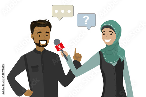 Female television reporter with microphone interviews arabic businessman
