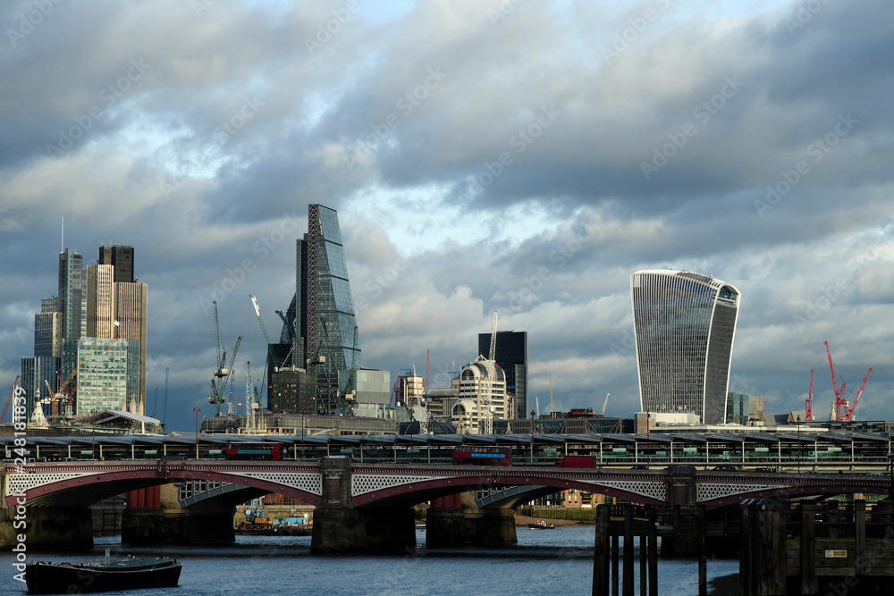 panorama with skyscraper against blue sky in london uk