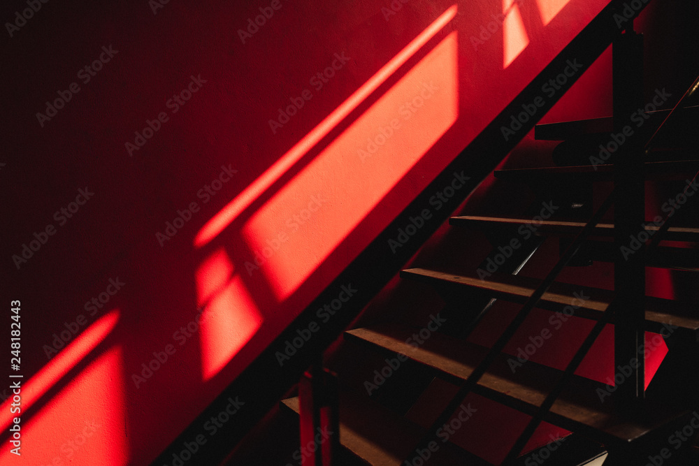 Fototapeta premium Red wall and stair can be used as background