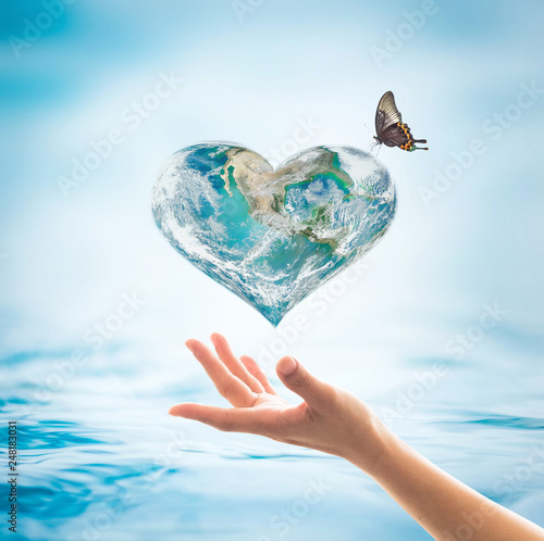 Saving water and environment care campaign concept with world in heart love shape: Elements of this image furnished by NASA
