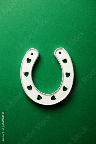St Patrick's Day green background with lucky horseshoe