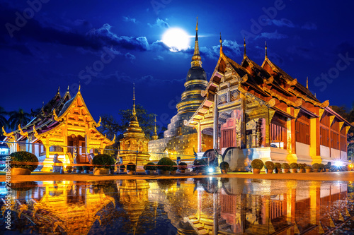 Wat Phra Singh temple at night in Chiang Mai, Thailand. photo