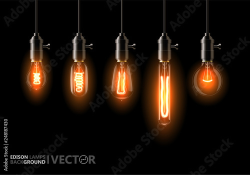 A set of five different lamps of Edison, weigh on the wires. On black background. For Your design, bars, cafes, restaurants, pubs, cafeteria.