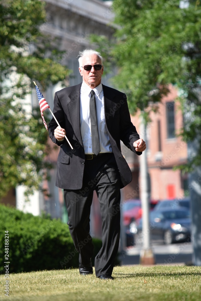 Portrait Of A Senior Male Politician Walking Portrait Of A Senior Male Politician Walking