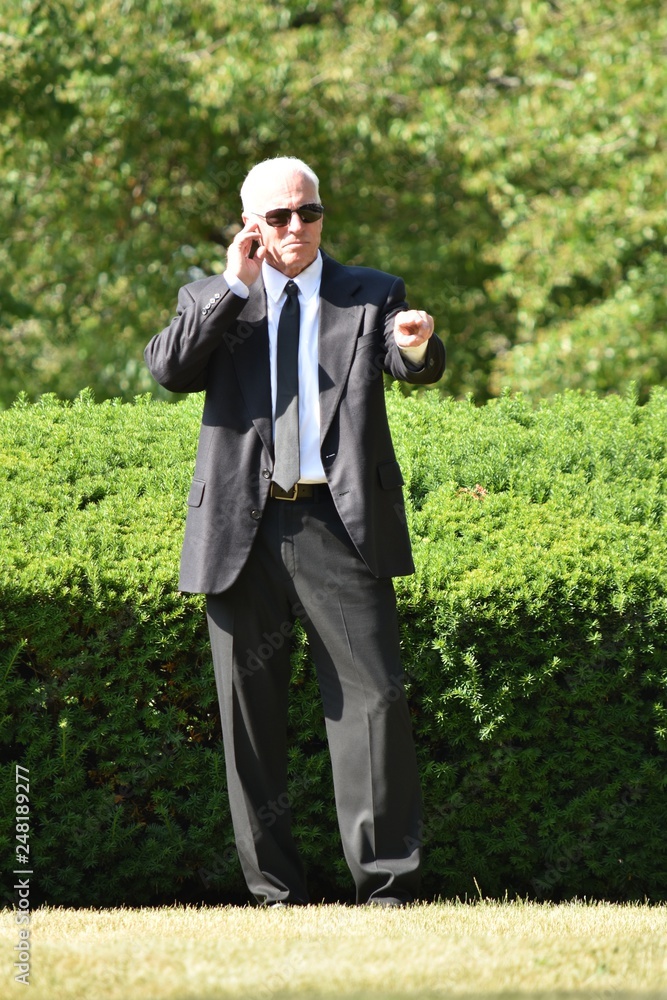 Handsome Senior Security Guard Pointing Walking Handsome Senior Security Guard Pointing Walking