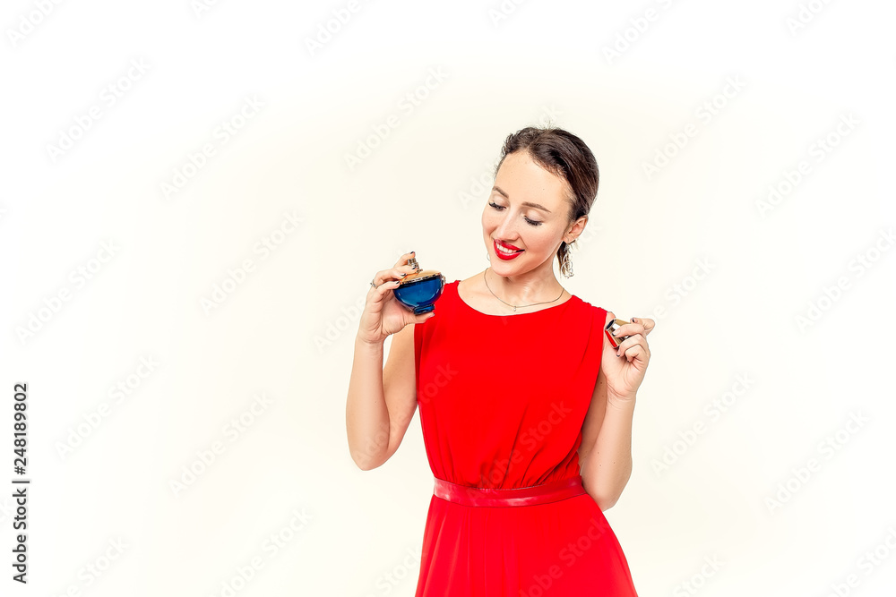 Portrait pretty woman sends air kiss with red balloon heart shape over blue background Portrait pretty woman sends air kiss with red balloon heart shape over blue background