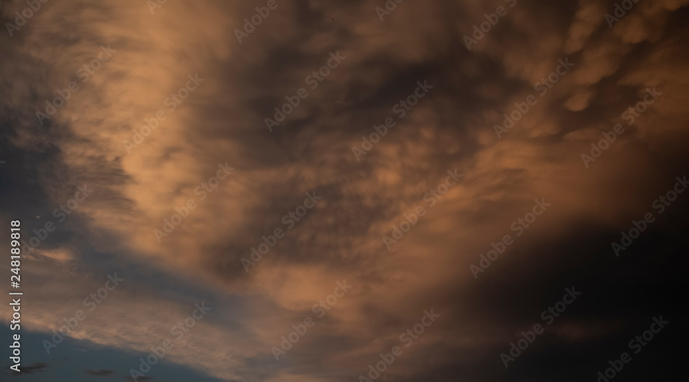  blue sky with orange clouds