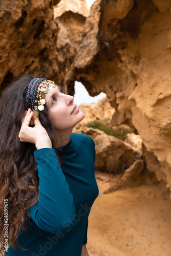 Model portrait with sand stone canyon rocks in the background