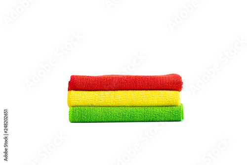 Stack of bright microfiber cloths. Isolated on white background. Place for text.
