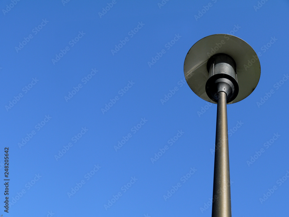 Street lamp against the blue sky Street lamp against the blue sky