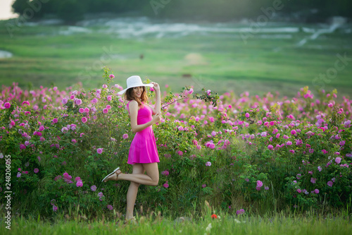 Girl in pink dress and vintage Cap photo