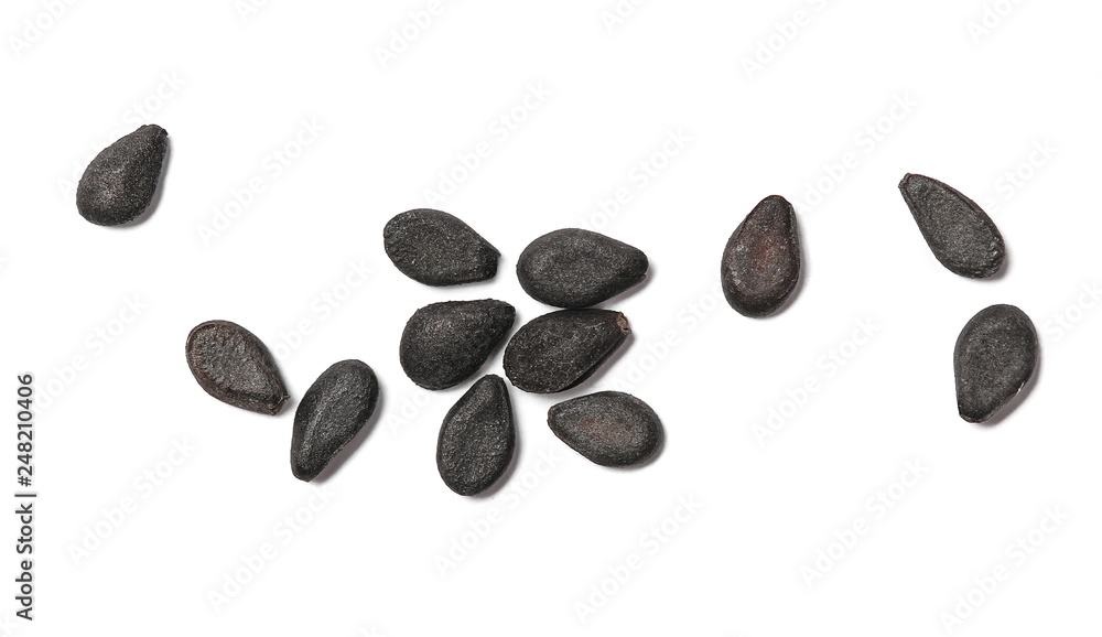 Black organic sesame seeds isolated on white background, macro and top view Black organic sesame seeds isolated on white background, macro and top view