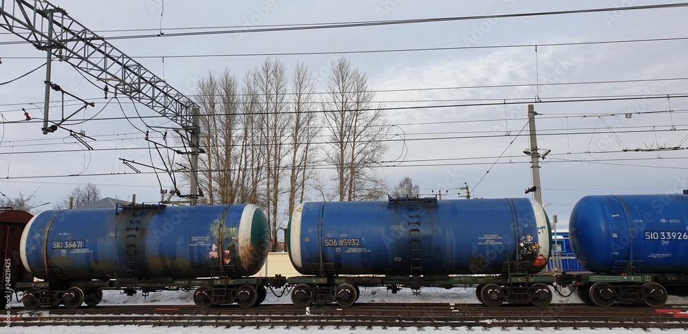 Naklejka premium Railway tanks with fuel. Transportation of oil. The composition of the tanks on the railway.