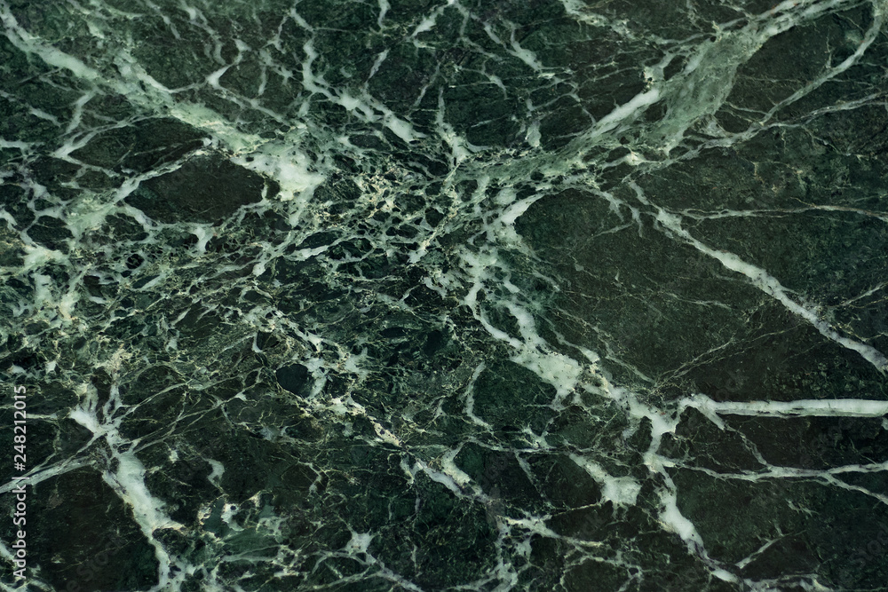 The dark green marble. Facing stone. Texture The dark green marble. Facing stone. Texture