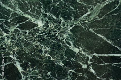 The dark green marble. Facing stone. Texture