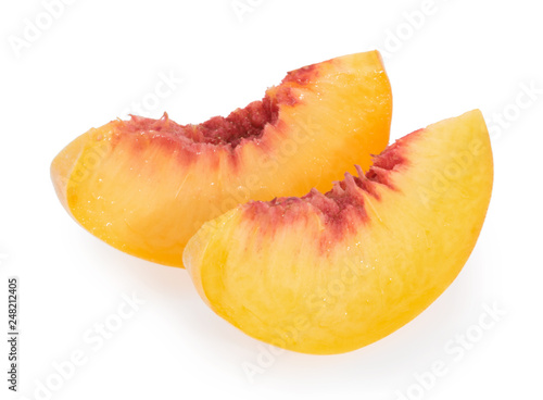 Peach slices isolated on white background