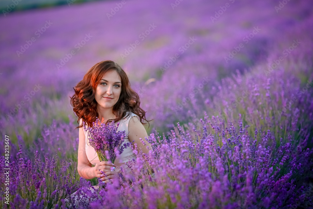 beautiful bride in luxurious wedding dress in purple lavender flowers. Fashion romantic stylish woman with violet bouquet. Alluring slim girl in sunset over lavenda waiting for groom - Provence France beautiful bride in luxurious wedding dress in purple lavender flowers. Fashion romantic stylish woman with violet bouquet. Alluring slim girl in sunset over lavenda waiting for groom - Provence France