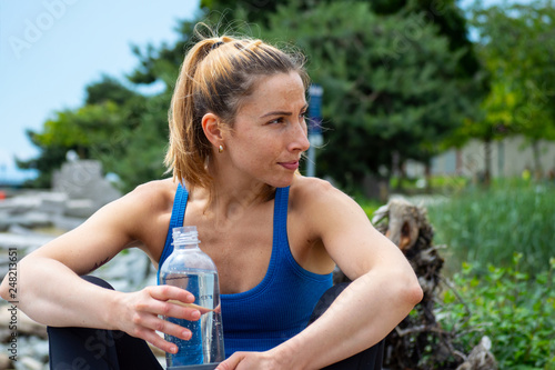 Women drinking water after workout in Vancouver BC