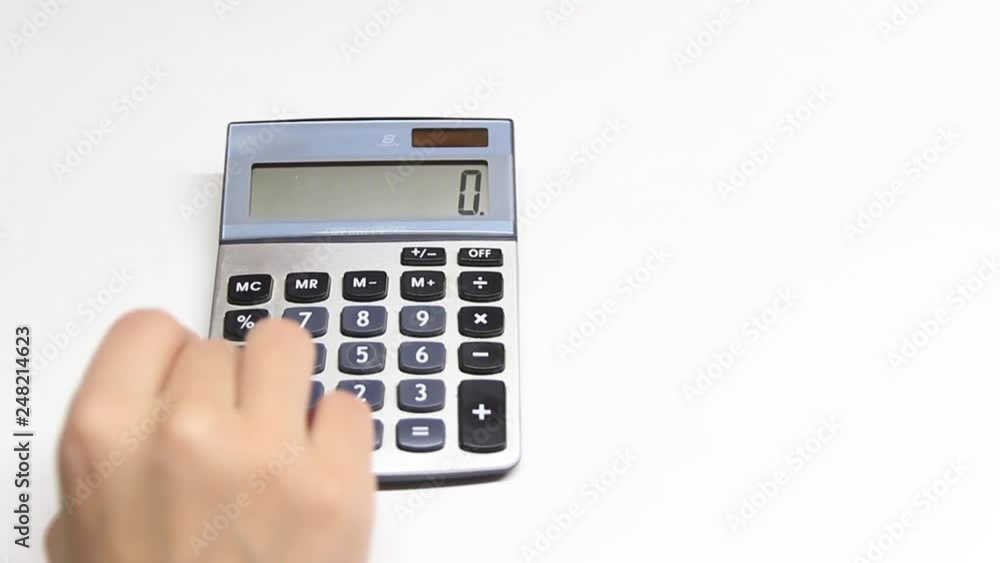 hand with calculator isolated on white background hand with calculator isolated on white background