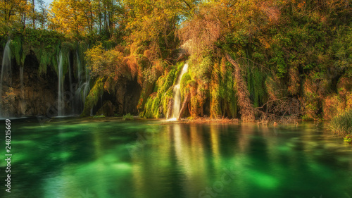 Plitvice Waterfalls in Croatia is one of the famous famous places in Europe, very beautiful. The jets of water on the background of autumn forests at sunrise are very picturesque 