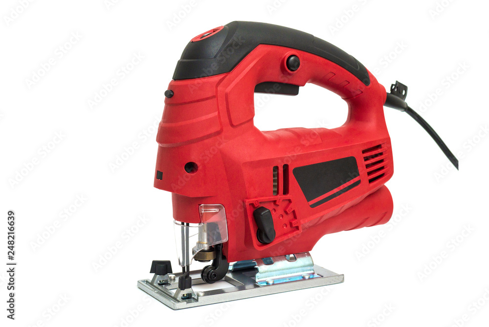A jigsaw power tool isolated on white background. Electric jig saw. Professional electric jig saw isolated on white background. Electric fretsaw on a white background A jigsaw power tool isolated on white background. Electric jig saw. Professional electric jig saw isolated on white background. Electric fretsaw on a white background