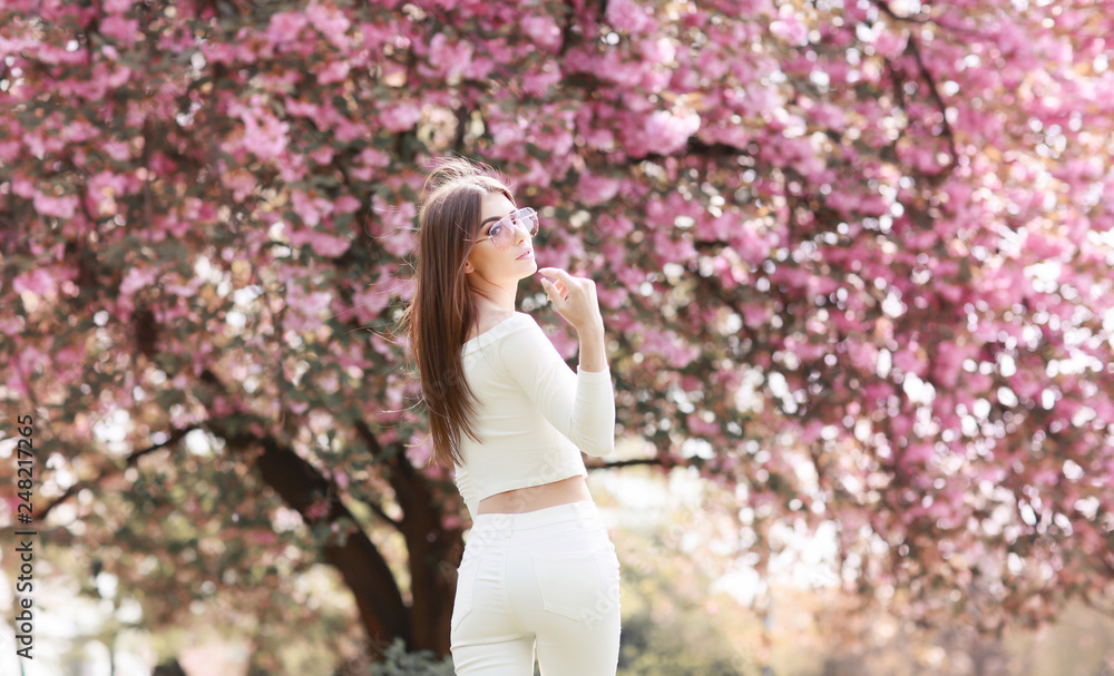 Fashion Art Beauty Portrait. Beautiful Girl in Fantasy Mystical and Magical Spring Garden. Model Fashion Art Beauty Portrait. Beautiful Girl in Fantasy Mystical and Magical Spring Garden. Model