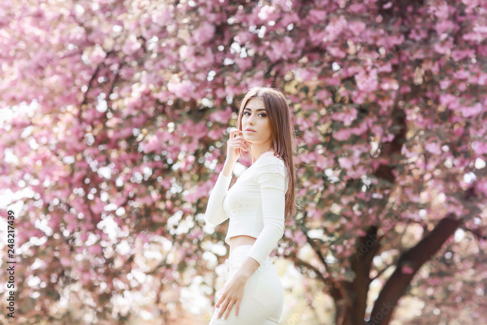 Fashion Art Beauty Portrait. Beautiful Girl in Fantasy Mystical and Magical Spring Garden. Model Fashion Art Beauty Portrait. Beautiful Girl in Fantasy Mystical and Magical Spring Garden. Model