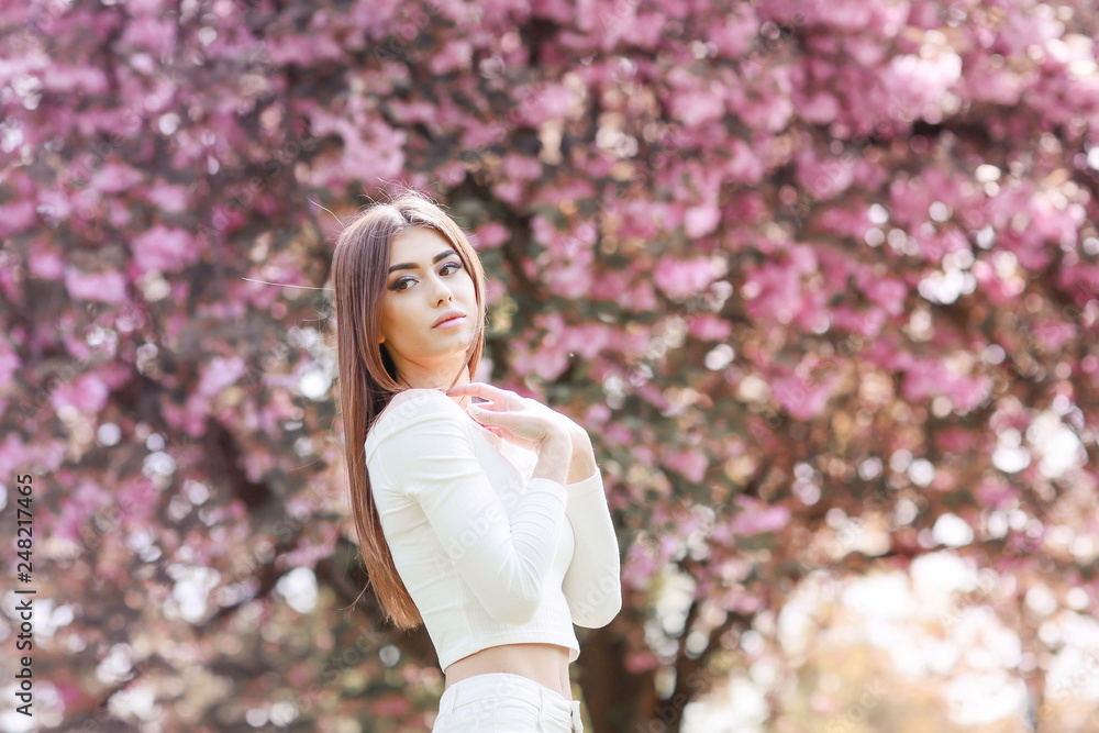Fashion Art Beauty Portrait. Beautiful Girl in Fantasy Mystical and Magical Spring Garden. Model Fashion Art Beauty Portrait. Beautiful Girl in Fantasy Mystical and Magical Spring Garden. Model