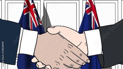 Businessmen or politicians shake hands against flags of Australia and New Zealand. Official meeting or cooperation related cartoon animation photo