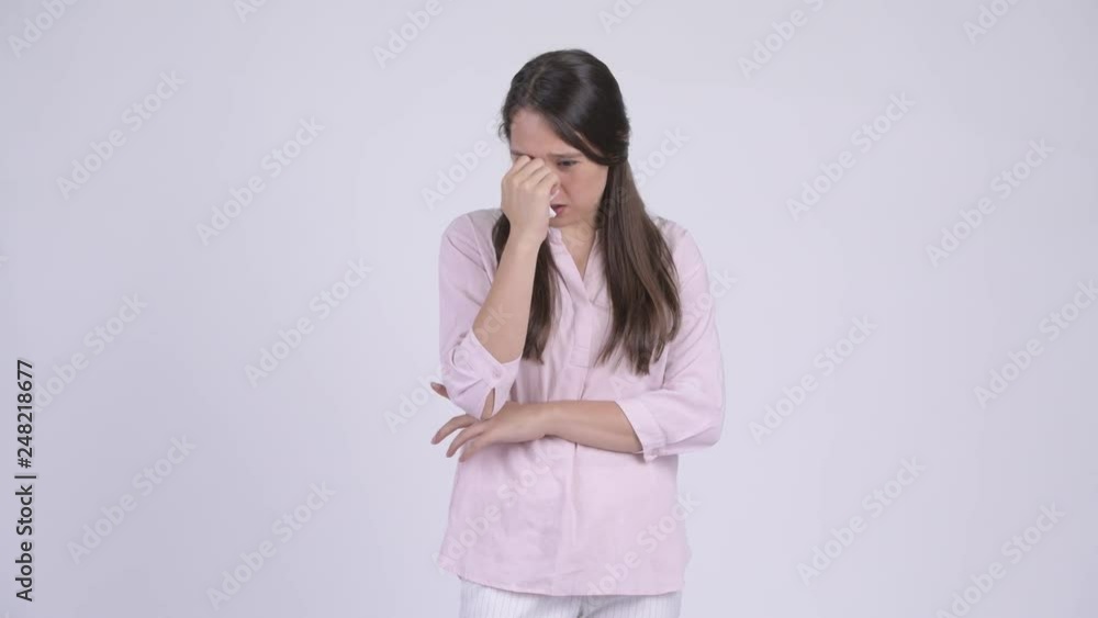 Young sad multi-ethnic businesswoman crying and using tissue Young sad multi-ethnic businesswoman crying and using tissue