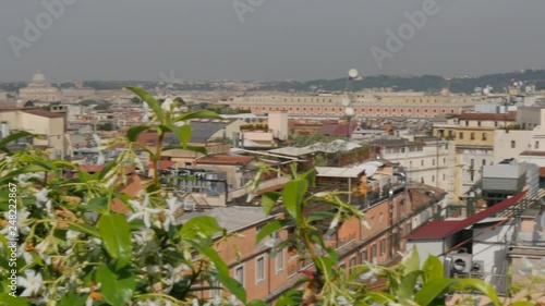 View of St PeterA�€™s Cathedral and rooftops of Rome, Rome, Lazio, Italy, Europe photo