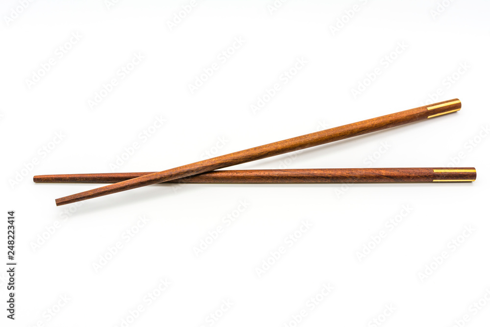 Wooden chopsticks isolated on white background. Wooden chopsticks isolated on white background.