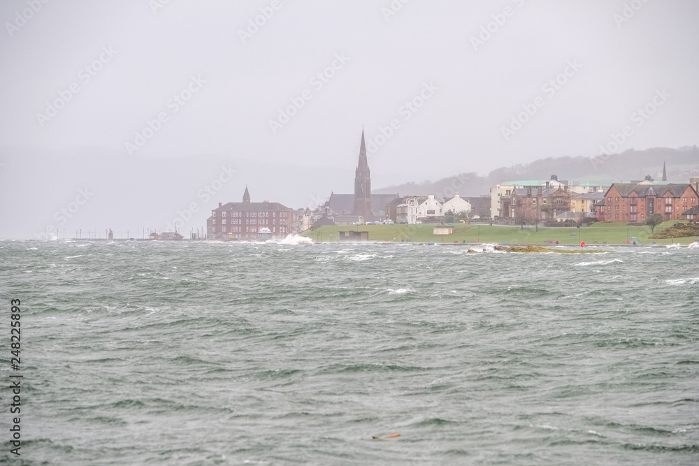 Storm Eric Hits the Seafront of Largs in the West Coast of Scotland High Winds and Waves break onto the Foreshore. Image was taken through heavy Rain.