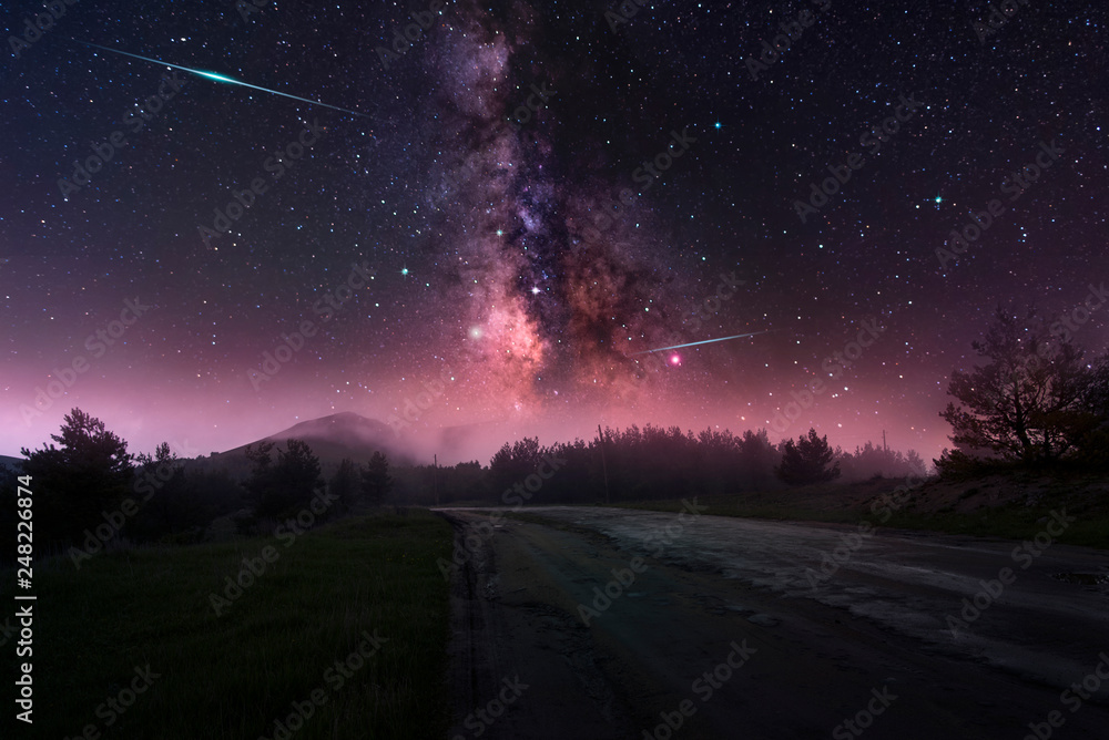 Beautiful night landscape road and milky way galaxy.  Armenia