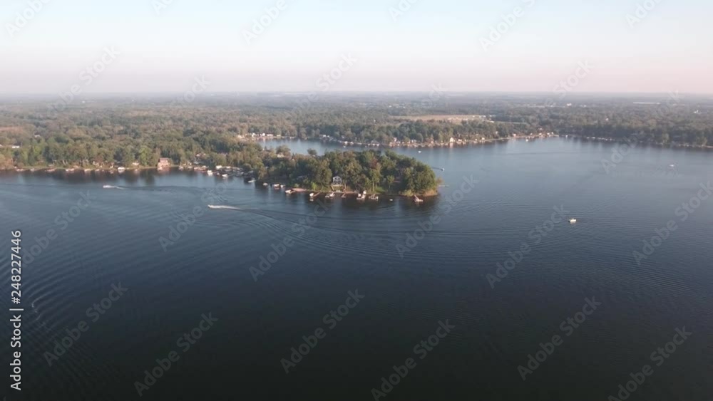 Aerial recreational boaters sailing on a fresh water sport and fishing lake Aerial recreational boaters sailing on a fresh water sport and fishing lake