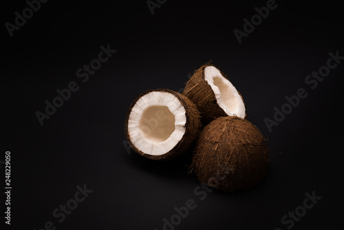 Coconut isolated on black background