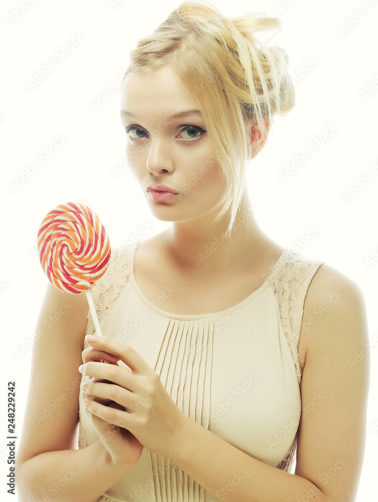 fashion blond woman  holding lollipop