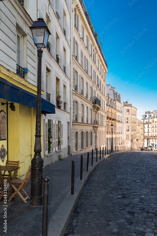Typical street in Montmartre, romantic place in Paris 