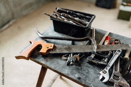 old work tool is on the table , small workroom with architecture dummy manufacturing