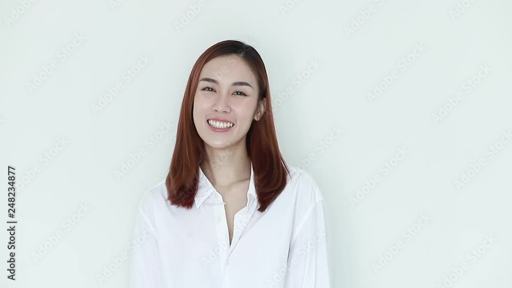 Sexy woman wearing white pajamas look bright, cheerful, smiling at the camera. Sexy woman wearing white pajamas look bright, cheerful, smiling at the camera.