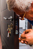 Locksmith fixing door lock