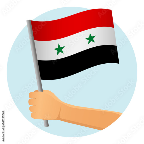 syria flag in hand