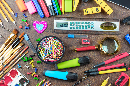 Back to school. Items for school classes in the composition on the table.