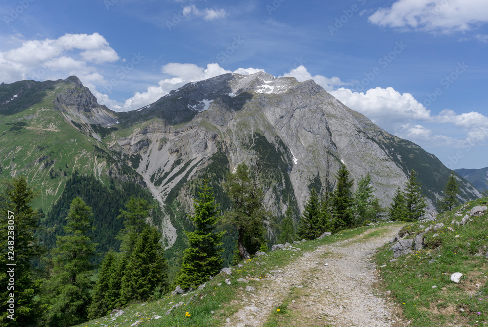 Dirt road high up in the Alps