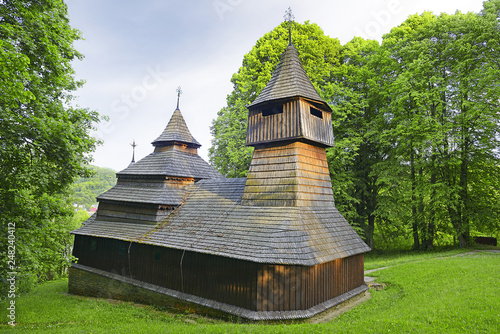 Greek-Catholic wooden Church of St. Kozmu and St. Damian dates back to 1708 and 1709, situated in the village of Lukov - Venecia near Bardejov, Slovakia. Old wooden churches are the pride of Slovakia photo