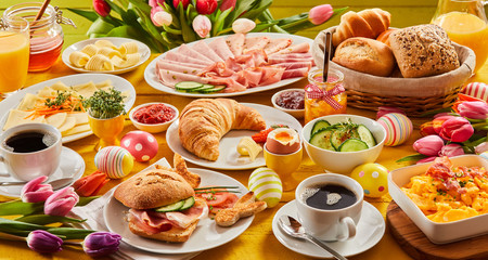 Heart Easter breakfast with eggs and tulips